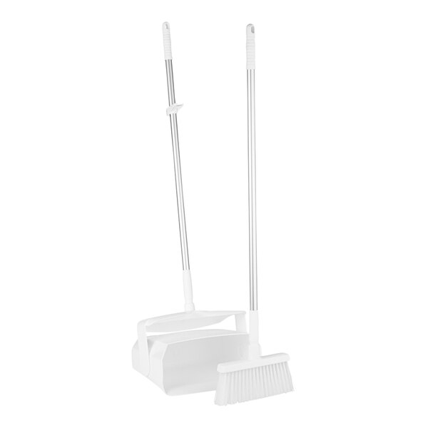 A white Remco lobby broom and dustpan with a long handle.