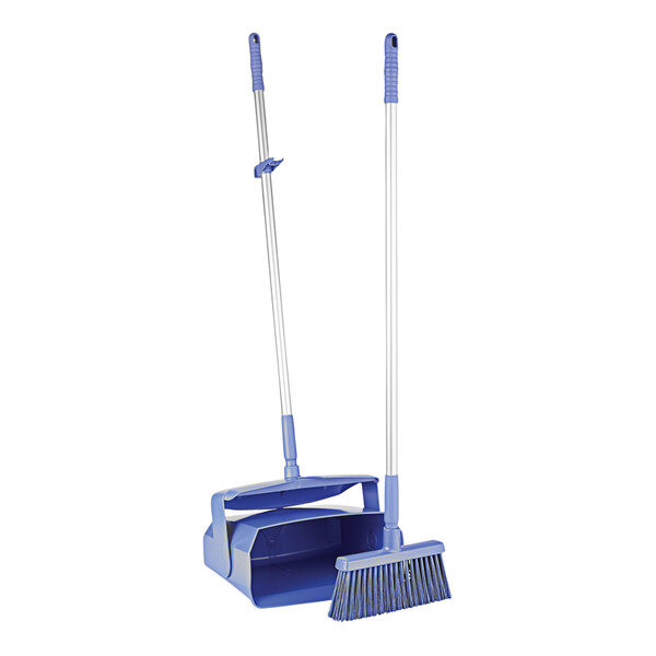 A purple Remco lobby broom and dustpan set with a straw broom.