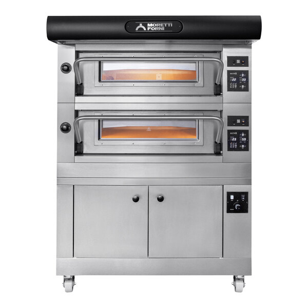 A large metal Moretti Forni double deck oven with two doors.