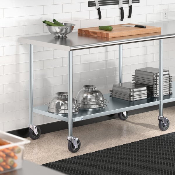 A Steelton stainless steel work table with an undershelf and casters.