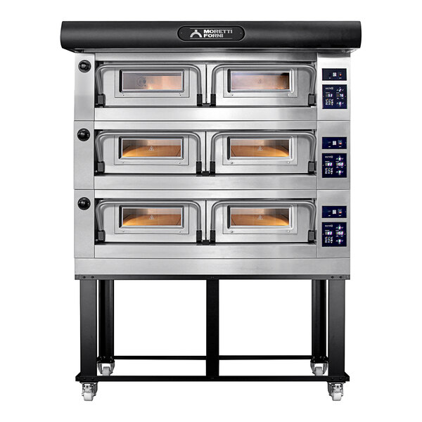 A Moretti Forni triple deck electric pizza oven on a stand with four tray holders.