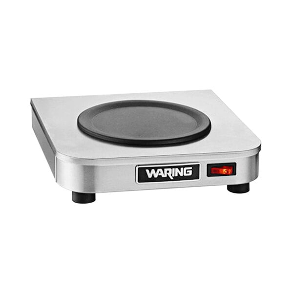 A Waring silver square coffee warmer on a counter.