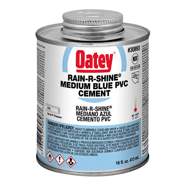 A can of Oatey Rain-R-Shine medium blue liquid cement with a label.