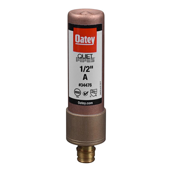 A close up of a Oatey Quiet Pipes hammer arrestor with a gold colored label.