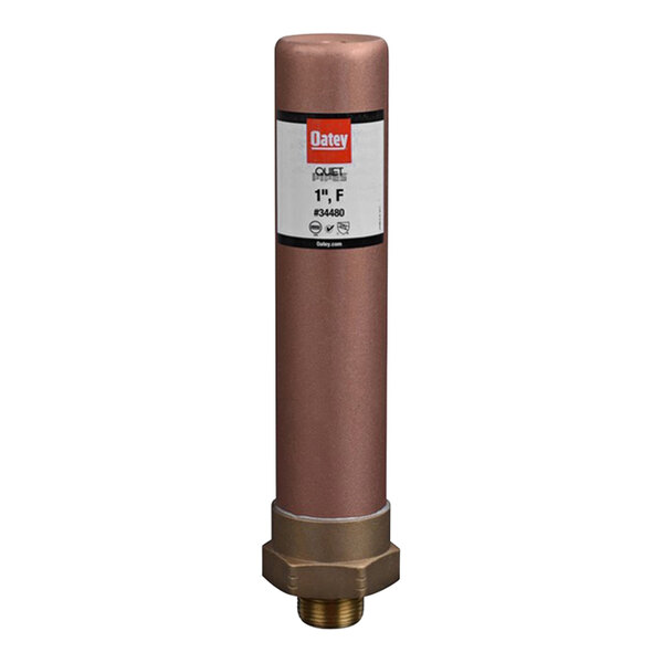 An Oatey copper hammer arrestor with a white label on a brown cylinder.