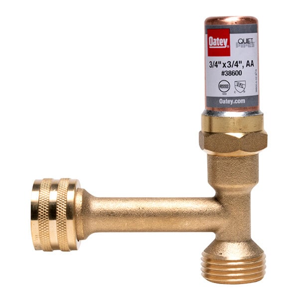 A brass Oatey tee with a tube on top.