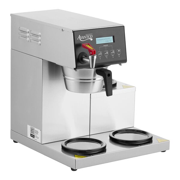 A digital automatic coffee maker with three lower decanter warmers.