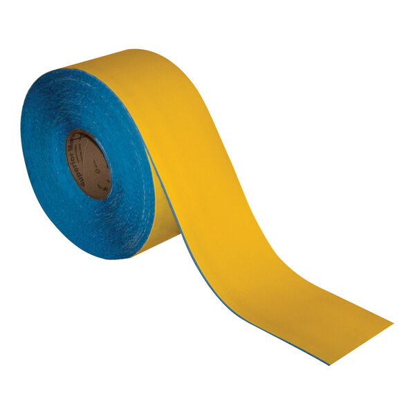 A roll of yellow and blue Superior Mark safety tape.