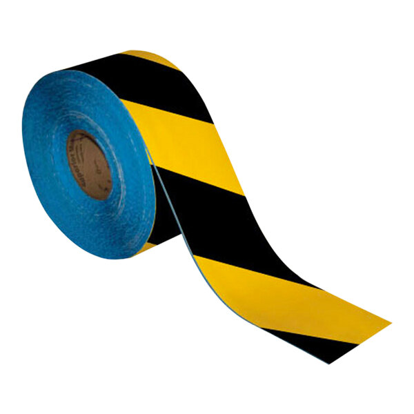 A roll of Superior Mark black and yellow striped safety tape.