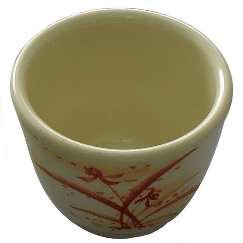 A close-up of a Thunder Group Gold Orchid melamine mug with a brown and orange design.