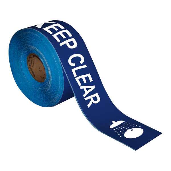 A roll of Superior Mark blue safety tape with white text that reads "Keep Clear"