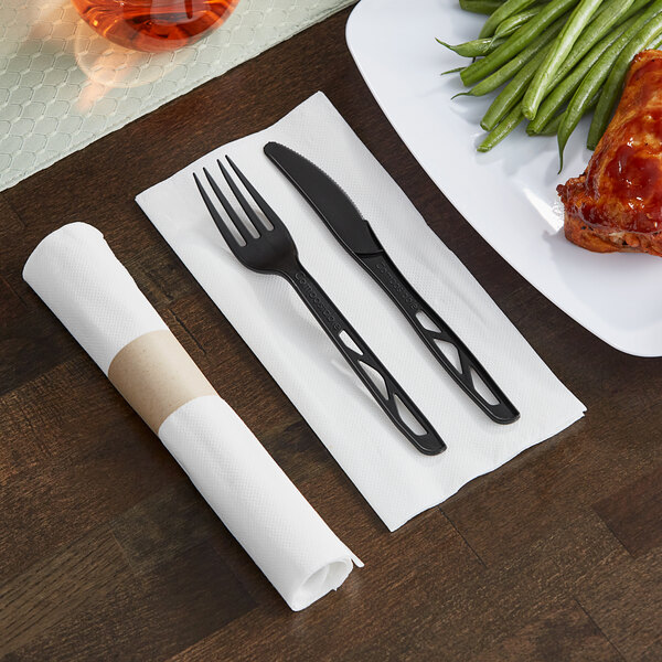 Hoffmaster CaterWrap 15 1/2" x 15 1/2" FashnPoint Pre-Rolled White Napkin and 2-Piece Compostable Black Plastic Cutlery Set - 50/Case