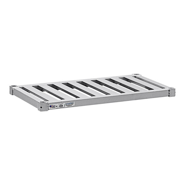 A New Age aluminum T-bar shelf with metal pallets and shelves on it.