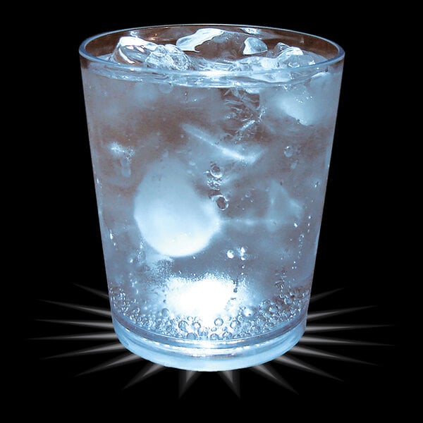 A 12 oz. customizable plastic rocks cup with clear liquid, ice, and bubbles, with a white LED light inside.