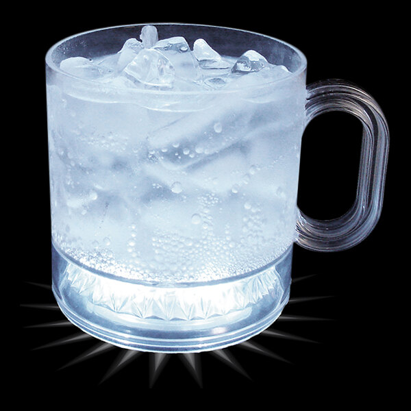 A clear plastic mug with ice and bubbles in it.