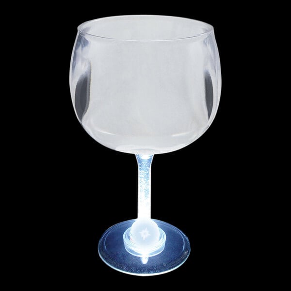 A clear plastic goblet with a white LED light inside it.