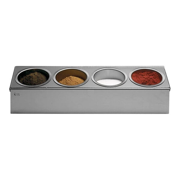 A Matfer Bourgeat stainless steel spice box with four compartments, each containing a different colored powder.