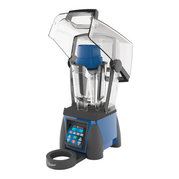 A Waring commercial blender with a blue lid and clear cup.