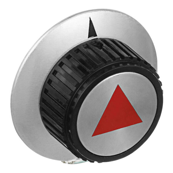 A round silver and black knob with a red triangle on it.