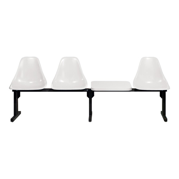 A Sol-O-Matic white modular seating unit with a table including three white plastic chairs with black legs.