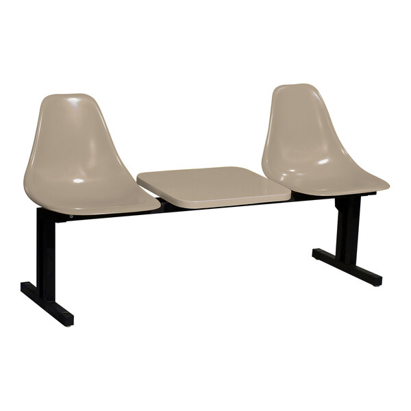 A Sol-O-Matic two-person beige plastic bench with a black base and table.