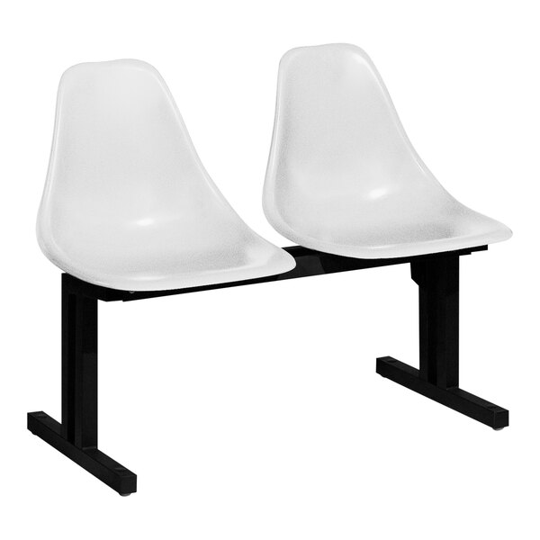A Sol-O-Matic white plastic modular seating unit with black legs holding two chairs.