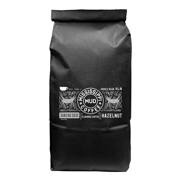 A black bag of Mississippi Mud Hazelnut Flavored Whole Bean Coffee with white text.