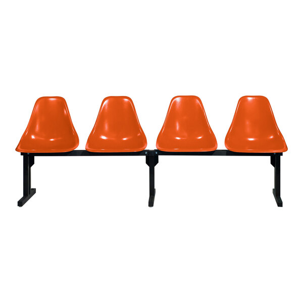 A row of three Sol-O-Matic orange plastic chairs with black legs.