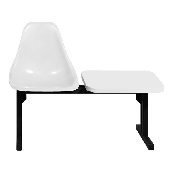 A white Sol-O-Matic seating unit with black trim and a table.