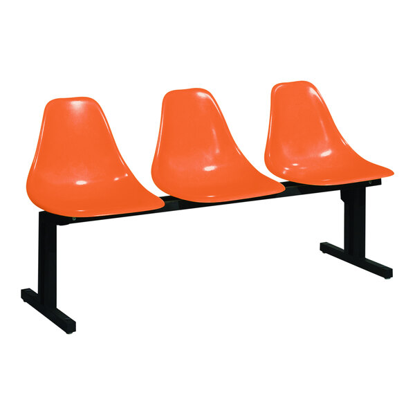A row of Sol-O-Matic orange plastic chairs with black legs.