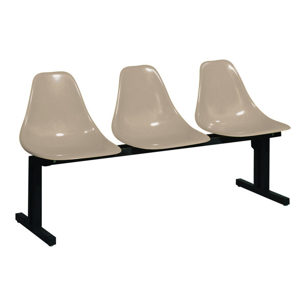A Sol-O-Matic modular bench with three beige chairs on a black base.