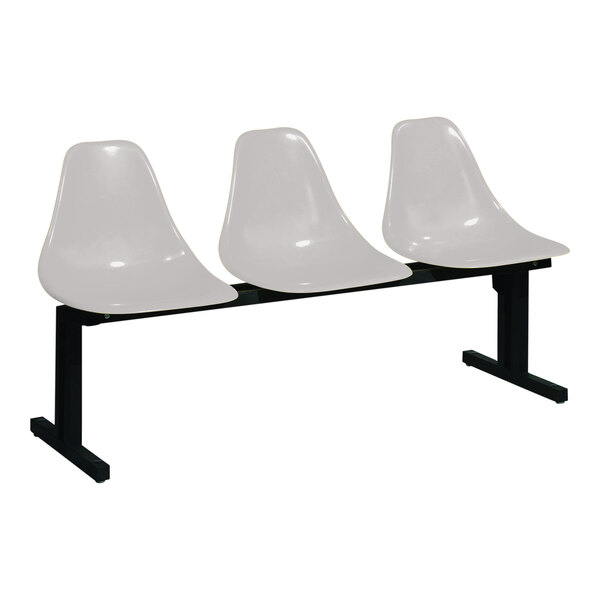 A Sol-O-Matic three-person modular seating unit with white plastic chairs and black bases.