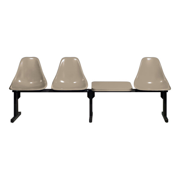 A Sol-O-Matic modular seating unit with three beige plastic chairs and a black table.