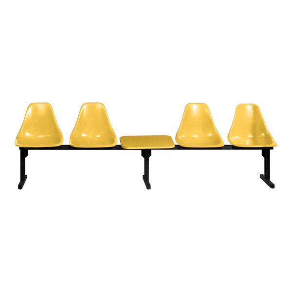 A row of three yellow plastic chairs with black legs on a black metal table.
