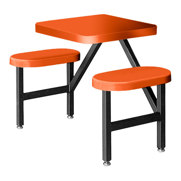 An orange Sol-O-Matic table with black seats.