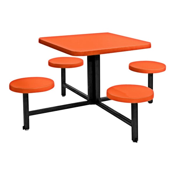 An orange table with four fixed seats.