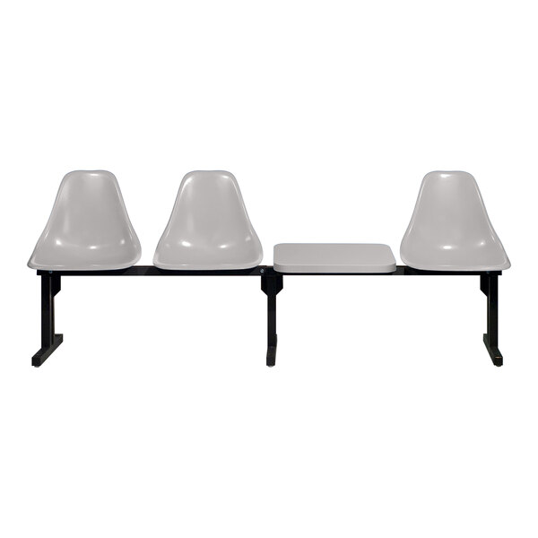 A Sol-O-Matic modular seating unit with three white plastic chairs and black legs.
