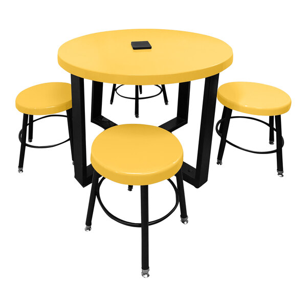 A marigold fiberglass Sol-O-Matic children's table with four stools.