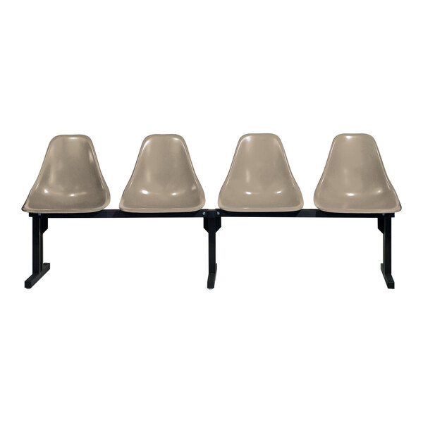 A row of three Sol-O-Matic beige plastic chairs with black bases.