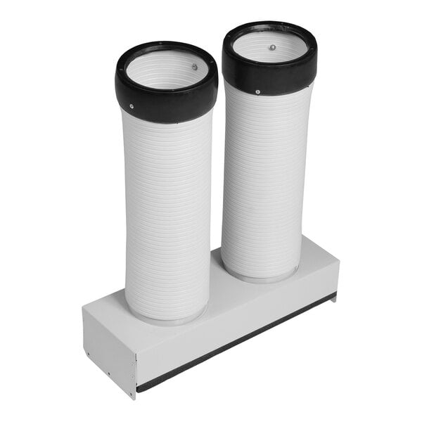 A white cylindrical object with a black lid and two white plastic pipes with black caps inside.