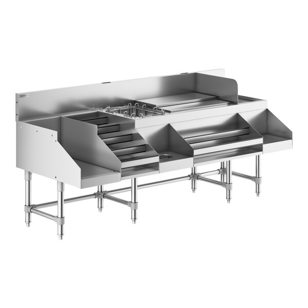 A Regency stainless steel cocktail station with a liquor display rack and drainboard.