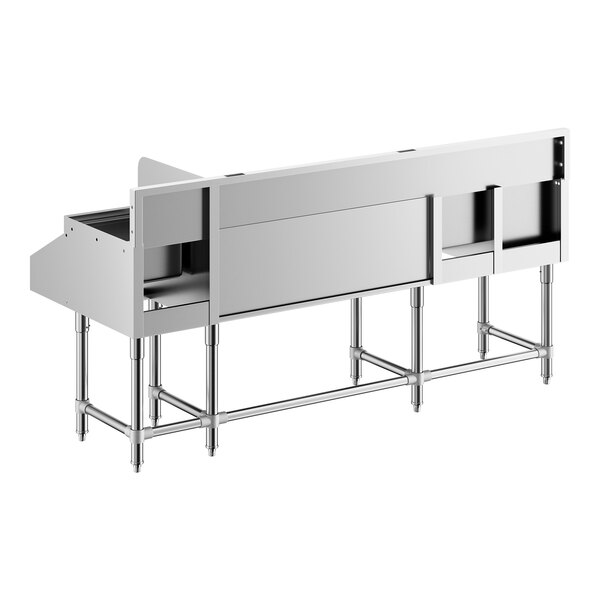 A long, stainless steel workstation with multiple compartments, elevated on metal legs, featuring a flat work surface and integrated sections for storage or display.