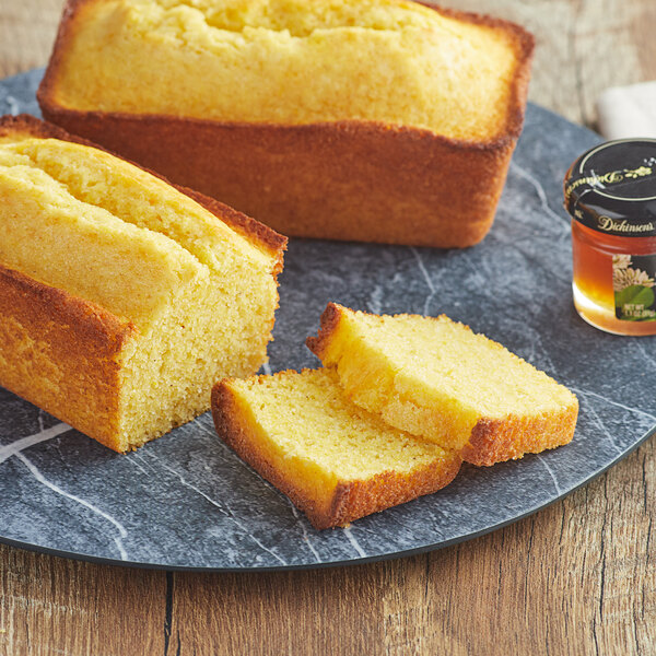 A loaf of cornbread on a table.