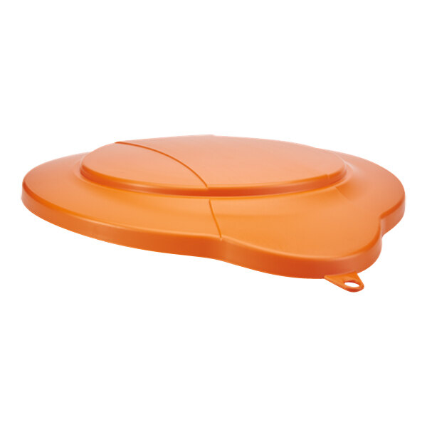 An orange plastic lid with a curved surface.