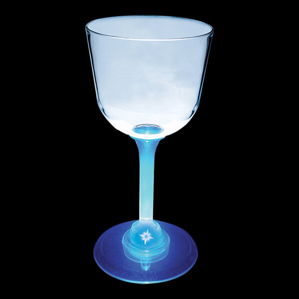 A clear plastic wine cup with a blue stem.