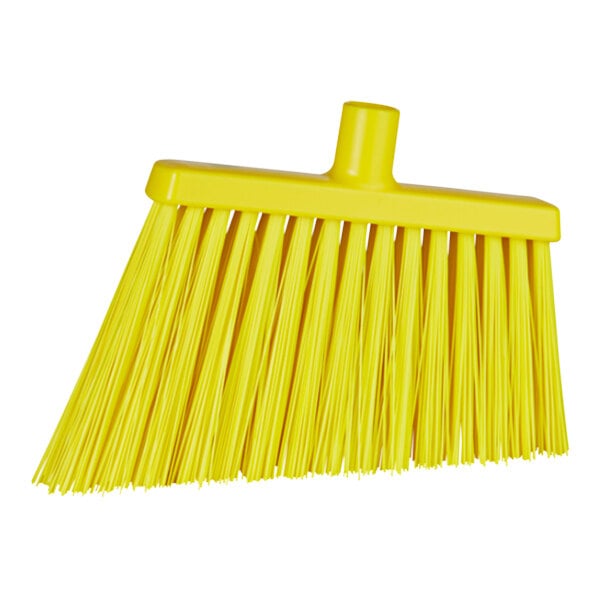 A close up of a yellow Vikan broom head with long bristles.