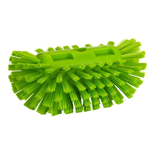 A close up of a Vikan lime green tank brush head with stiff bristles.