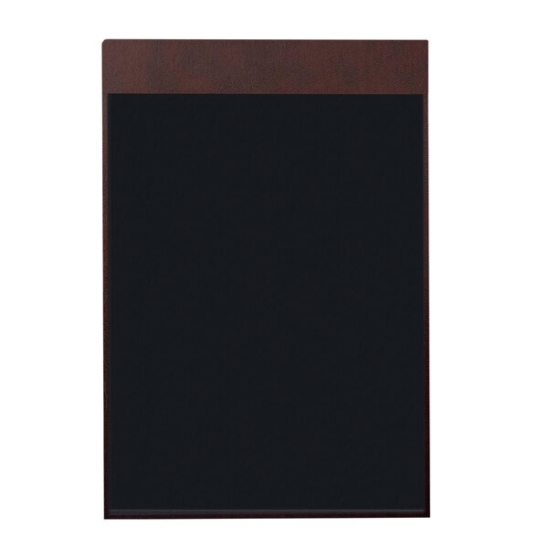 A black board with a brown frame on a table.