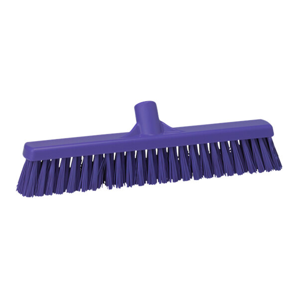 A close-up of a purple Vikan push broom head with flagged bristles.