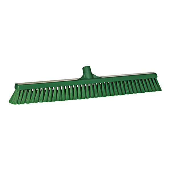 A green Vikan push broom head with flagged bristles.